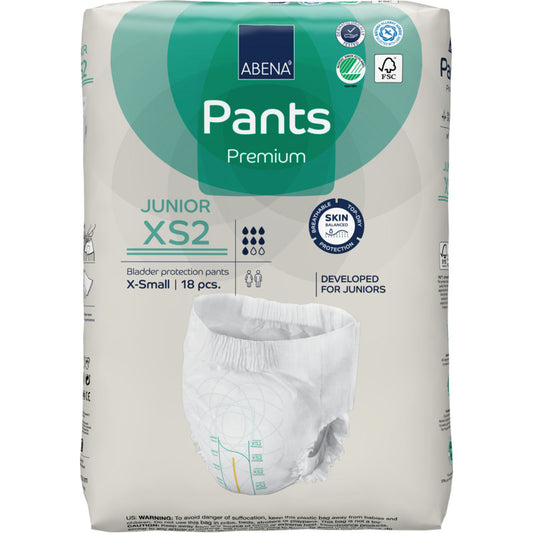 Eine Packung ABENA Pants Junior Premium, Gr. XS2 (18 Stück) von Abena Re-Seller GmbH bietet Blasenschutz für Junioren. Die Verpackung zeigt Produkteigenschaften, Zertifizierungslogos und eine Abbildung der Windel.