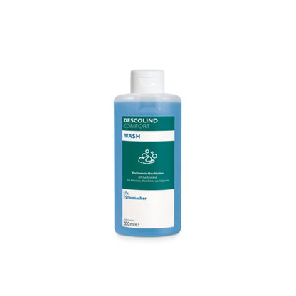 Ένα μπουκάλι των 500ml Dr. Schumacher Waschlotion DESCOLIND COMFORT WASH της Dr. Schumacher GmbH με λευκό καπάκι, μπλε υγρό και μια ετικέτα με αλλαντοΐνη και το λογότυπο Dr. Schumacher σε λευκό φόντο.