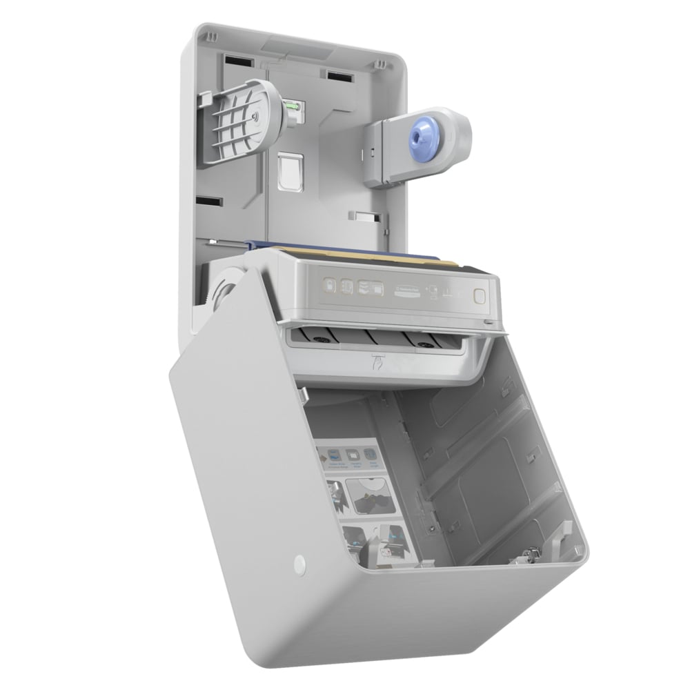 Der Kimberly-Clark Professional™ Icon™ Elektronische No Touch - Losse Module - Rolle / Silver Mosaic von Kimberly-Clark GmbH ist ein wandmontierter, offener Spender mit sichtbaren Komponenten und einer bebilderten Anleitung auf der Innenseite der vorderen Abdeckung.