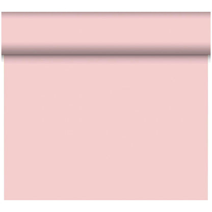 Eine Rolle Duni GmbH Bio-DC-Tete a Tete 0,4x24m hellrosa Tapete wird teilweise abgerollt, so dass ihre glatte, feste Oberfläche zum Vorschein kommt; der obere Teil bleibt gerollt, während der Rest vertikal hängt.