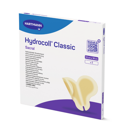 Μια συσκευασία Hartmann Hydrocoll Classic Sacral αποστειρωμένη και σφραγισμένη μεμονωμένα 12 x 18 cm της Paul Hartmann AG περιέχει 5 επιθέματα για υγρή θεραπεία τραυμάτων. Η συσκευασία περιέχει λεπτομέρειες προϊόντος και μια εικόνα του επιδέσμου.