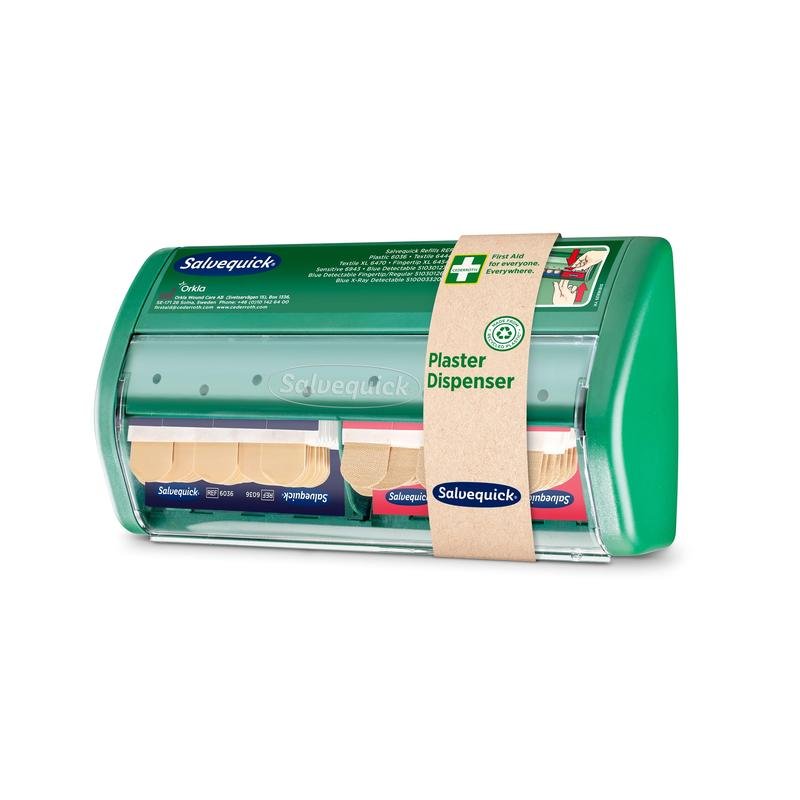Η θήκη επιδέσμων Salvequick από την Orkla Wound Care AB | Συσκευασία (1 τεμάχιο) είναι μια πράσινη, διαφανής θήκη για επιδέσμους με μια μπεζ ταινία χαρτιού "Pflasterspender", που έχει σχεδιαστεί για γρήγορη και εύκολη πρόσβαση στους επιδέσμους.