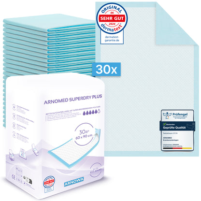 Eine Packung mit 30 ARNOMED SUPERDRY PLUS extra saugfähigen Betteinlagen (ARNOWA GmbH), je 60x90 cm mit SAP, ungefaltet und versiegelt für dermatest und Qualität gezeigt. Superabsorber sorgt für eine effektive Inkontinenzversorgung.