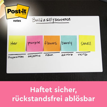 Ένας πίνακας δείχνει πολύχρωμα 3M Post-it® σημειώματα (Poptimistic Collection, 38x51mm, 100 φύλλα/μπλοκ, 12 μπλοκ/συσκευασία) με την επιγραφή "Τα μοβ λουλούδια σας μυρίζουν ελάχιστα" πάνω από κατηγορίες γραμματικής. Γερμανικό κείμενο: "Κολλάει με ασφάλεια, αφαιρείται χωρίς υπολείμματα."