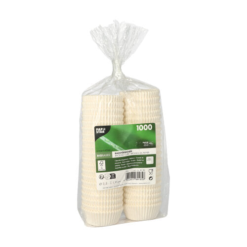 Σε μια διαφανή πλαστική σακούλα υπάρχει ένας στοίβος από 1.000 PAPSTAR 1000 φορμάκια της PAPSTAR GmbH, με μια πράσινο-λευκή μεσαία ετικέτα με λεπτομέρειες προϊόντος.