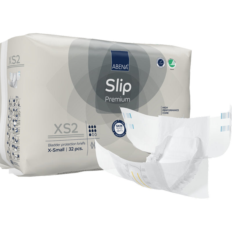 Eine Packung ABENA Slip Premium von Abena Re-Seller GmbH, Größe X-Small, mit 32 Blasenschutzslips. Ein Slip ist vorne aufgefaltet dargestellt und zeigt sein Design für eine effektive Inkontinenzversorgung.