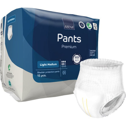 Μια συσκευασία με 15 ABENA Pants Light της Abena Re-Seller GmbH, μέγεθος Light Medium. Στην εικόνα, μπροστά από τη μπλε και λευκή συσκευασία, απεικονίζεται ένα διακριτικό παντελόνι για ενήλικες.