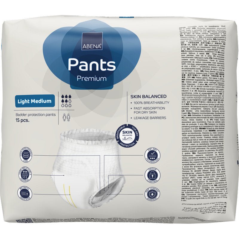 Μια συσκευασία 15 τεμαχίων ABENA Pants Light (Abena Re-Seller GmbH) μεσαίου μεγέθους, με λεπτομέρειες προϊόντος, εικονίδια, κείμενο σε διάφορες γλώσσες και μια εικόνα παντελονιού μίας χρήσης για ακράτεια στην μπροστινή πλευρά της συσκευασίας.