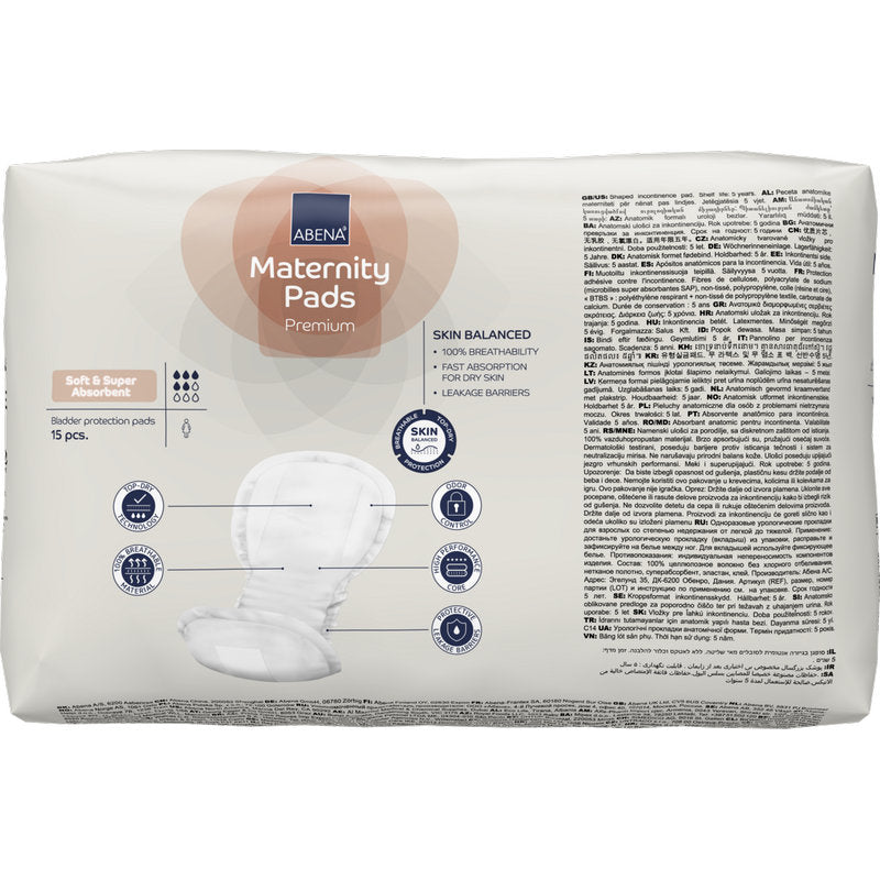 Abgebildet ist eine Packung ABENA Maternity Pad, Premium (15 Stück) der Abena Re-Seller GmbH mit den Merkmalen Saugfähigkeit, Hautbalance und Auslaufsperre auf einer mehrsprachigen Verpackung.