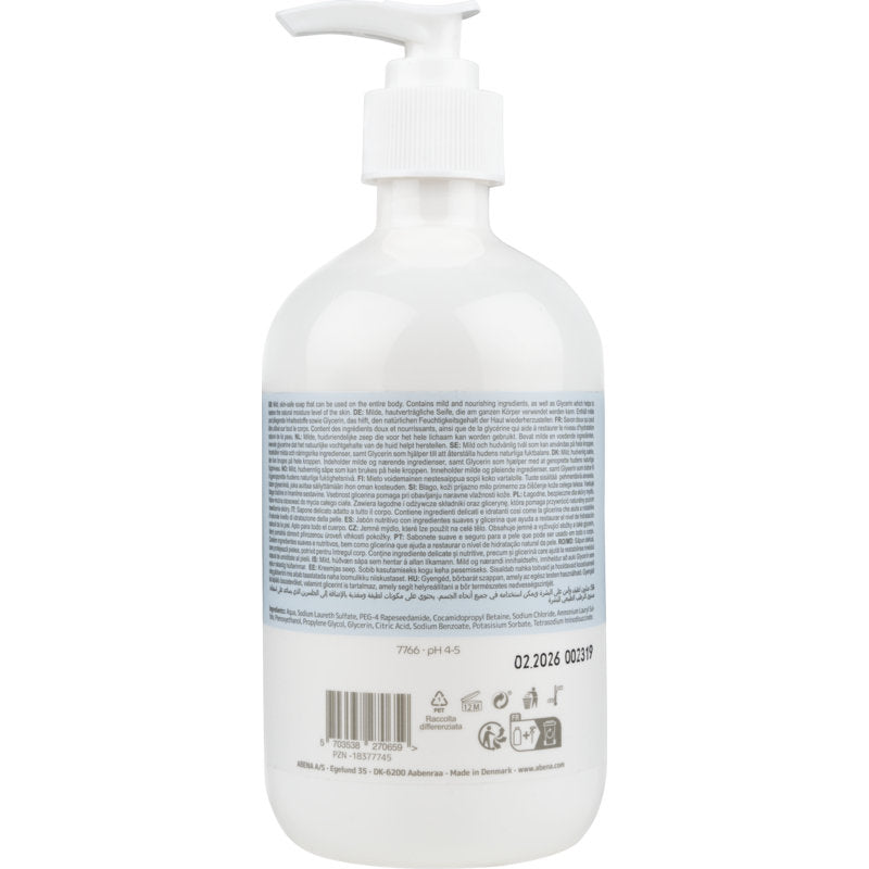 Ένα διάφανο πλαστικό μπουκάλι με λευκή αντλία με την επιγραφή "Απαλό κρεμοσάπουνο χωρίς άρωμα" από την Abena Re-Seller GmbH συνοδεύεται από μια μεγάλη μπλε-λευκή ετικέτα και πολυγλωσσικές πληροφορίες προϊόντος στο πίσω μέρος.