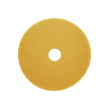 Ένα κίτρινο, κυκλικό Arcora Sunshine Fine No3 Block (χαρτόνι, 10 τεμάχια) από την Arcora International GmbH με κεντρική οπή, όπως φαίνεται από πάνω σε λευκό φόντο - ιδανικό ως προϊόν καθαρισμού για τον επαγγελματικό καθαρισμό.