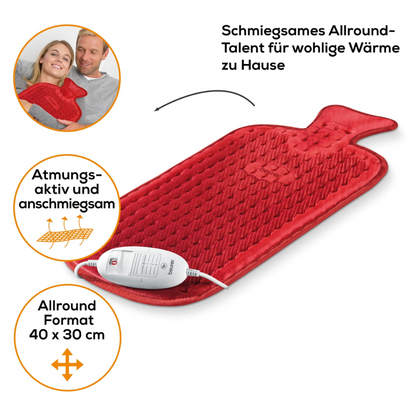 Απεικονίζεται ένα Beurer HK 44 θερμοφόρα της Beurer GmbH με υφή επιφάνειας και ηλεκτρικό έλεγχο. Ένα ζευγάρι χαλαρώνει μαζί και κρατά τη θερμοφόρα στα χέρια τους. Το κείμενο στα ελληνικά υπογραμμίζει τα χαρακτηριστικά: αναπνεύσιμο υλικό, καλή εφαρμογή, 3 θερμοκρασιακές βαθμίδες και μορφή allround 40x30 εκ.