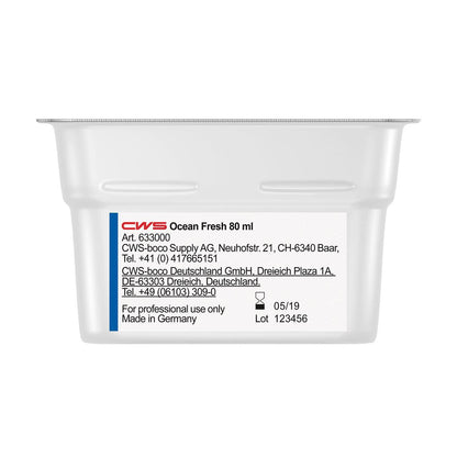 Ένα λευκό δοχείο 80 ml με την επιγραφή "CWS ParadiseLine άρωμα χώρου για διανομέα αρώματος Paradise Air Bar" από την CWS, κατασκευάζεται στη Γερμανία για επαγγελματική χρήση, με οδηγίες και στοιχεία επικοινωνίας. Ημερομηνία λήξης 05/19, αριθμός παρτίδας 123456.