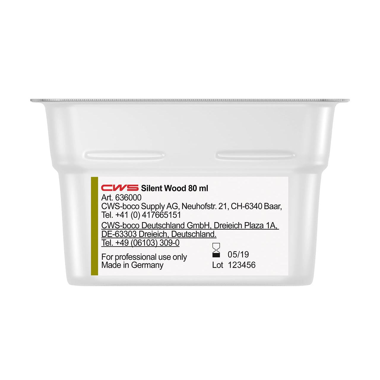 Κοντινή λήψη ενός δοχείου CWS ParadiseLine άρωμα χώρου για διανομέα αρώματος Paradise Air Bar με πληροφορίες κατασκευαστή, στοιχεία επικοινωνίας, αριθμό παρτίδας και ημερομηνία λήξης στην ετικέτα. Μόνο για επαγγελματική χρήση.