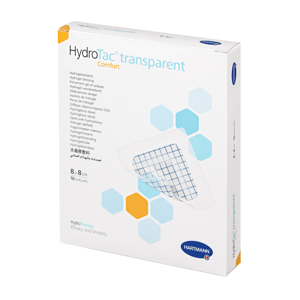 Ένα κουτί Hartmann HydroTac® transparent comfort επίδεσμος πληγών της Paul Hartmann AG. Η συσκευασία είναι λευκή με μπλε και τυρκουάζ σχεδιαστικά στοιχεία και περιέχει μια εικόνα του προϊόντος καθώς και περιγραφές σε πολλές γλώσσες.
