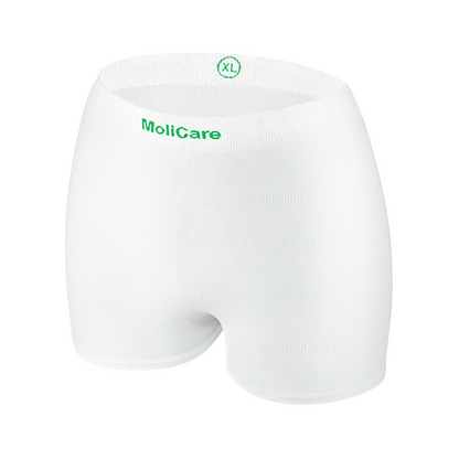 Λευκά Hartmann MoliCare® Fixpants εσώρουχα μιας χρήσης της Paul Hartmann AG, πράσινα με την επιγραφή «XL» σε λευκό φόντο. Σχεδιασμένα για ενήλικες, ιδανικά για τη στερέωση επιθεμάτων ακράτειας με άνετη, ασφαλή εφαρμογή χωρίς ραφές.
