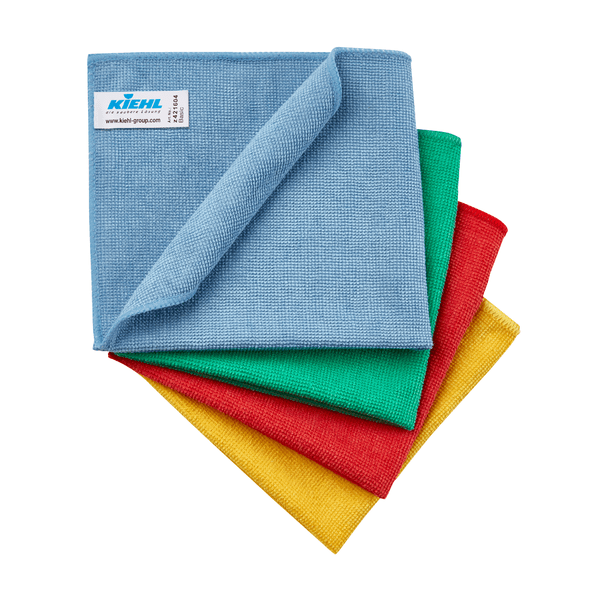 Τέσσερις μικροΐνες Kiehl Basic (35 x 32 cm, 270 g/τ.μ.) της Johannes Kiehl KG σε χρώματα μπλε, πράσινο, κόκκινο και κίτρινο είναι στοιβαγμένες, με το μπλε πανί να βρίσκεται στην κορυφή και σε μια γωνία να φέρει ορατή ετικέτα της Johannes Kiehl KG.