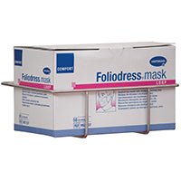 Μια βάση στήριξης κουτιού μάσκας Novocal από ανοξείδωτο ατσάλι (για στερέωση στη ράγα Euro, 1 τεμάχιο/συσκευασία) κρατά ένα ορθογώνιο κουτί με την επιγραφή "Foliodress mask", που περιέχει μάσκες προσώπου μίας χρήσης. Μάρκα: Novocal.