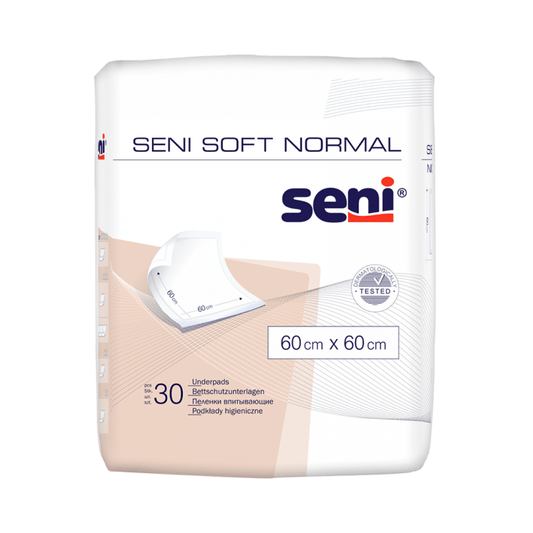Eine Packung Seni Soft Normal Bettschutzunterlagen der TZMO Deutschland GmbH mit 30 Stück. Die Verpackung ist überwiegend weiß und blau, mit Produktinformationen in mehreren Sprachen und einer Grafik, die die Unterlage zeigt. Die Größe beträgt 60 cm x 60 cm.