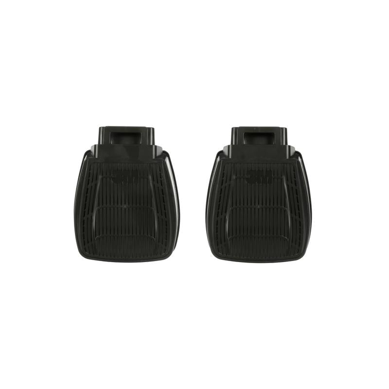 Zwei schwarze Filtergehäuse mit gerippter Oberfläche und rechteckiger Form, nebeneinander auf hellem Hintergrund dargestellt.
